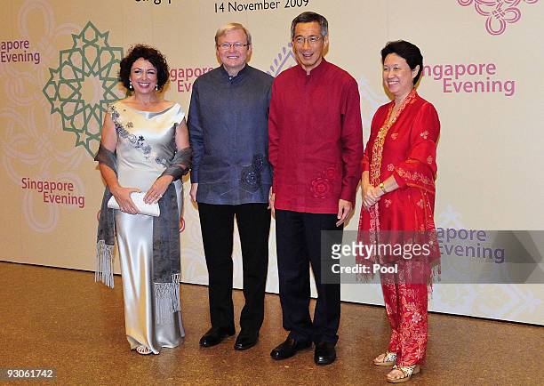 Singapore's Prime Minister Lee Hsien Loong and his wife Ho Ching welcome China's Australia's Prime Minister Kevin Rudd and his wife Therese Rein at...