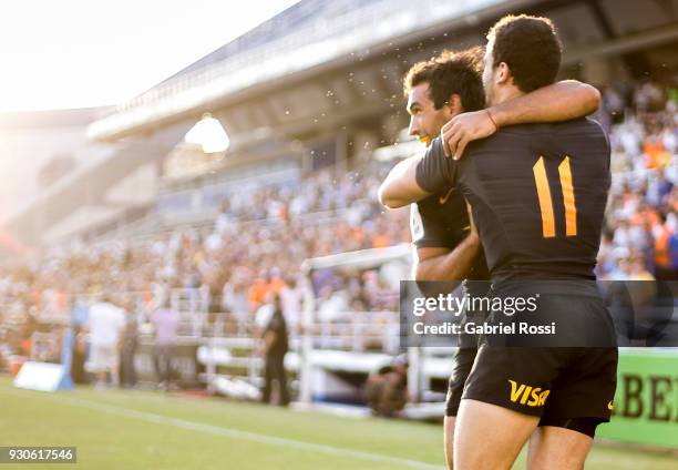 Emiliano Boffelli of Jaguares celebrates with a teammates after scoring a try during a match between Jaguares and Waratahs as part of fourth round of...