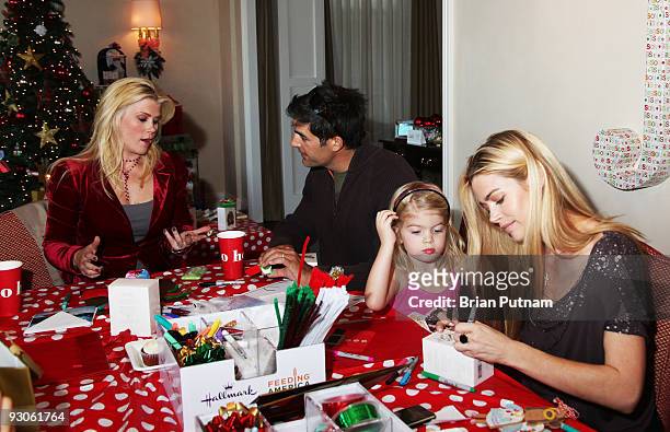 Actors Alison Sweeney, Galen Gering and Denise Richards with her daughter Sam attend 'Alison Sweeney Hosts Hallmark Holiday Event to Benefit Feeding...