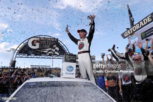 Kevin Harvick, driver of the Jimmy John's Ford, celebrates in Victory Lane after winning the Monster Energy NASCAR Cup Series TicketGuardian 500 at...