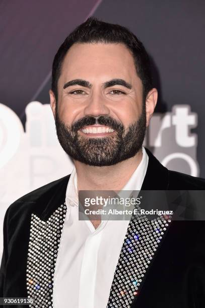 Chairman and Chief Creative Officer of iHeartLatino Enrique Santos arrives at the 2018 iHeartRadio Music Awards which broadcasted live on TBS, TNT,...