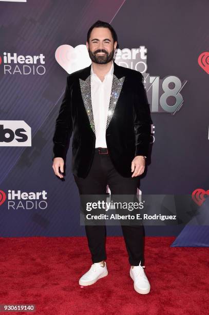 Chairman and Chief Creative Officer of iHeartLatino Enrique Santos arrives at the 2018 iHeartRadio Music Awards which broadcasted live on TBS, TNT,...