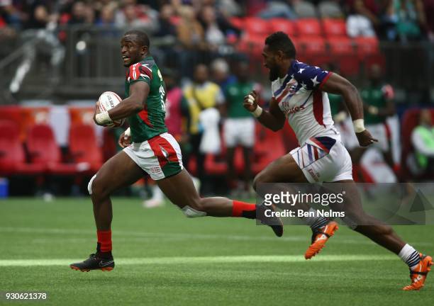 Willy Ambaka of Kenya scores a try against Matai Leuta of the United States away during the Canada Sevens, the Sixth round of the HSBC Sevens World...