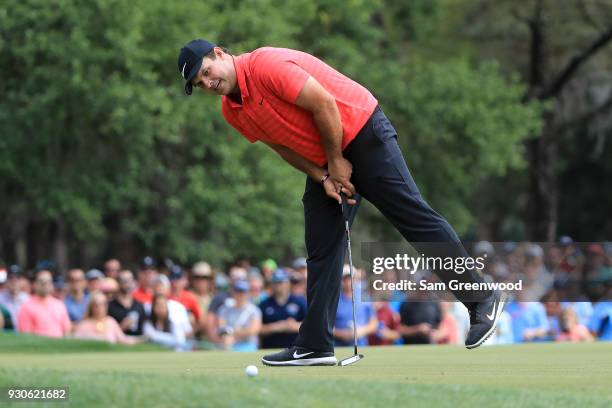 Patrick Reed reacts after a putt on the 13th green during the final round of the Valspar Championship at Innisbrook Resort Copperhead Course on March...