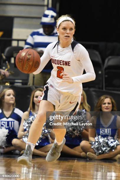 Chassidy Omogrosso of the Duquesne Lady Dukes dribbles up court during the quarterfinal round of the Atlantic-10 Women's Basketball Tournament...