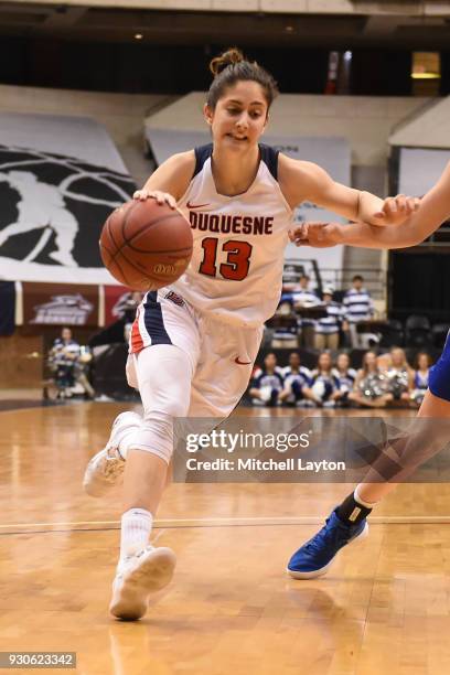 Julijana Vojinovic of the Duquesne Lady Dukes dribbles the ball during the quarterfinal round of the Atlantic-10 Women's Basketball Tournament...