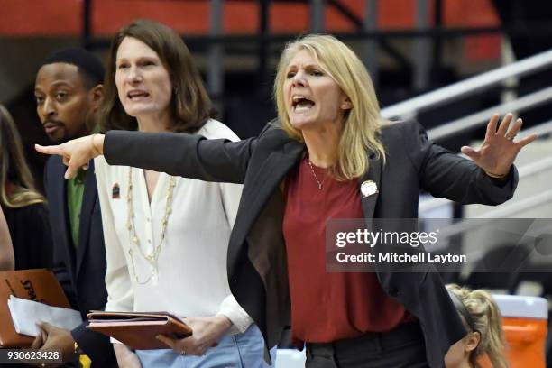 Head coach Cindy Griffin of the St. Joseph Hawks signals her players during the quarterfinal round of the Atlantic-10 Women's Basketball Tournament...