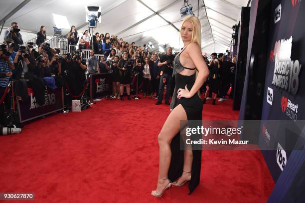 Iggy Azalea arrives at the 2018 iHeartRadio Music Awards which broadcasted live on TBS, TNT, and truTV at The Forum on March 11, 2018 in Inglewood,...