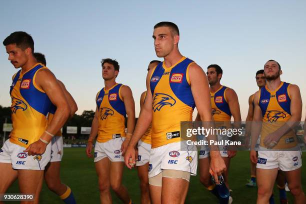 The Eagles walk from the field after being defeated during the JLT Community Series AFL match between the Fremantle Dockers and the West Coast Eagles...