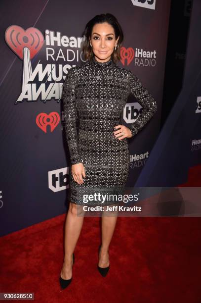 Courtney Laine Mazza arrives at the 2018 iHeartRadio Music Awards which broadcasted live on TBS, TNT, and truTV at The Forum on March 11, 2018 in...