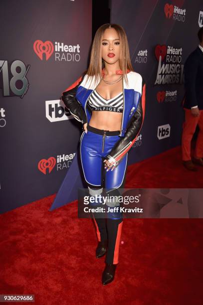 Serayah McNeill arrives at the 2018 iHeartRadio Music Awards which broadcasted live on TBS, TNT, and truTV at The Forum on March 11, 2018 in...