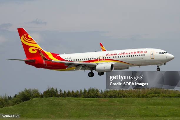 Hainan Airlines Boeing 737-800 landing at Tokyo Narita airport.