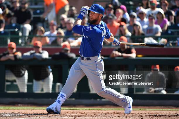 Alex Gordon of the Kansas City Royals swings at a pitch in the spring training game against the San Francisco Giants at Scottsdale Stadium on...