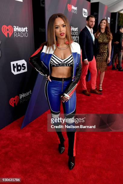 Serayah McNeill arrives at the 2018 iHeartRadio Music Awards which broadcasted live on TBS, TNT, and truTV at The Forum on March 11, 2018 in...