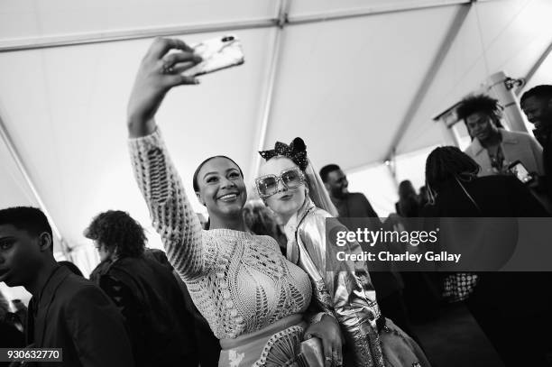 Nia Sioux and JoJo Siwa attend the 2018 iHeartRadio Music Awards which broadcasted live on TBS, TNT, and truTV at The Forum on March 11, 2018 in...