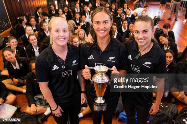 To R, Kendra Cocksedge, Lesley Ketu and Selica Winiata pose with students and the Women's Rugby World Cup during a New Zealand Rugby Media briefing &...