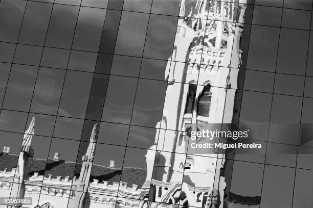 Madrid Buildings. The church of the Inmaculada Concepcion is reflected in the windows of an office building. The calle de Goya, leads up to the...