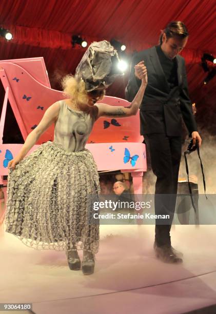 Singer Lady Gaga and artist Francesco Vezzoli perform during the MOCA NEW 30th anniversary gala held at MOCA on November 14, 2009 in Los Angeles,...