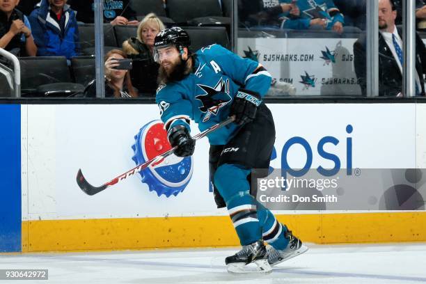 Brent Burns of the San Jose Sharks passes the puck during a NHL game against the St. Louis Blues at SAP Center on March 8, 2018 in San Jose,...