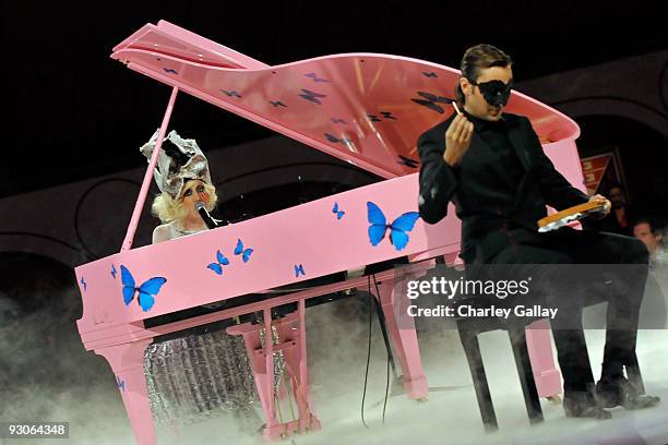 Artist Francesco Vezzoli and musician Lady Gaga perform during the MOCA NEW 30th anniversary gala held at MOCA on November 14, 2009 in Los Angeles,...