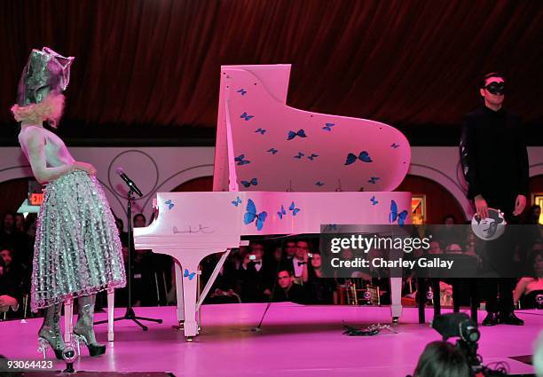 Musician Lady Gaga and artist Francesco Vezzoli perform during the MOCA NEW 30th anniversary gala held at MOCA on November 14, 2009 in Los Angeles,...