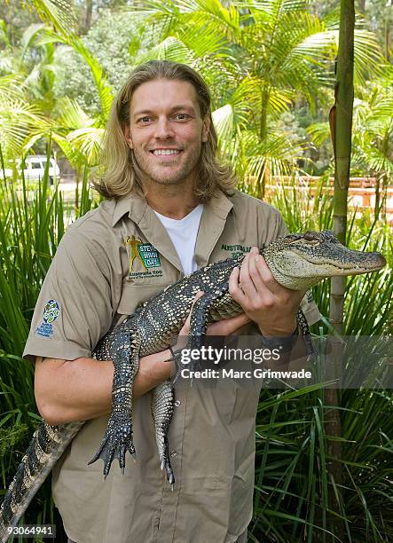 Superstar Edge nurses an alligator during Steve Irwin Day celebrations at Australia Zoo on November 15, 2009 in Sunshine Coast, Australia.