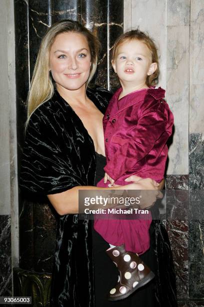 Elisabeth Rohm and her daughter arrive to the Los Angeles premiere of "Dr. Seuss': How The Grinch Stole Christmas! - The Musical" held at the...
