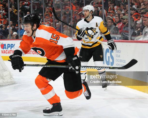 Jori Lehtera of the Philadelphia Flyers skates against Kris Letang of the Pittsburgh Penguins on March 7, 2018 at the Wells Fargo Center in...