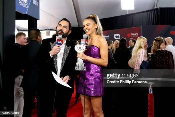 Leslie Grace poses in the press room during the 2018 iHeartRadio Music Awards which broadcasted live on TBS, TNT, and truTV at The Forum on March 11,...