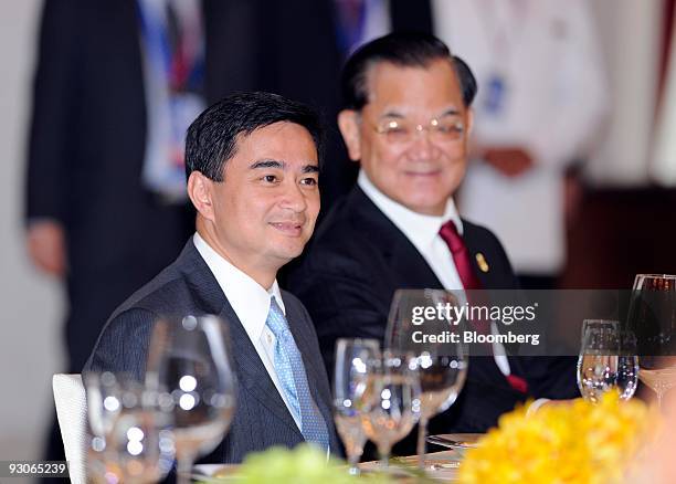 Abhisit Vejjajiva, Thailand's prime minister, left, and Lien Chan, Taiwan's representative and former chairman of the Kuomintang, attend the...