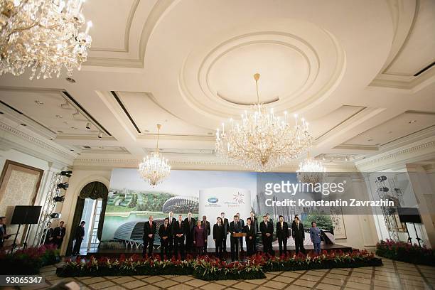Singapore's Prime Minister Lee Hsien Loong speaks surrounded by APEC Leaders at the declaration ceremony at the end of the the APEC Summit in in...