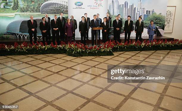 Singapore's Prime Minister Lee Hsien Loong speaks surrounded by APEC Leaders at the declaration ceremony at the end of the the APEC Summit in in...