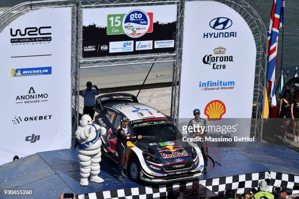 Sebastien Ogier from France and Julien Ingrassia from France celebrate their victory in the final podium in Leon during Day Four of the WRC Mexico on...