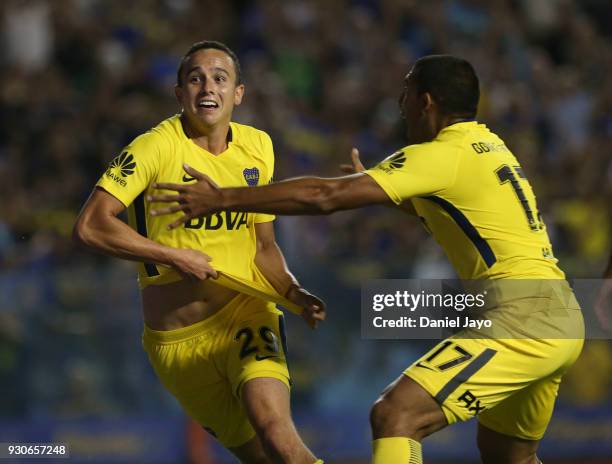 Leonardo Jara of Boca Juniors celebrates with teammate Ramon Abila of Boca Juniors after scoring during a match between Boca Juniors and Tigre as...