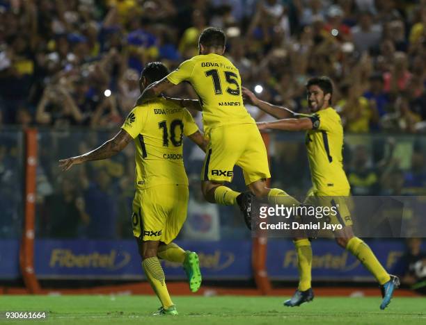 Edwin Cardona of Boca Juniors celebrates with teammates after scoring during a match between Boca Juniors and Tigre as part of the Superliga 2017/18...