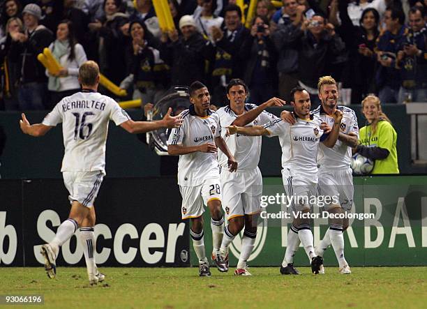 Landon Donovan of the Los Angeles Galaxy celebrates after converting a penalty kick for a goal in the second extra time period during the MLS Western...