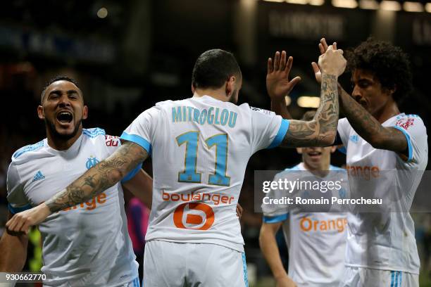 Konstantinos Mitroglou Dimitri Payet and Luiz Gustavo of Marseille react after goal of Marseille during the Ligue 1 match between Toulouse and...