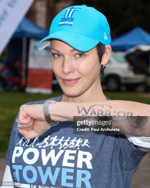 Actress Erin Cummings ,Tattoo Detail, attends the "Power Of Tower" run/walk at UCLA on March 11, 2018 in Los Angeles, California.