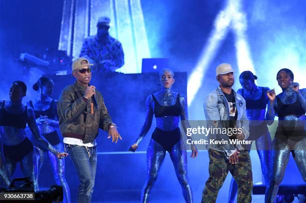 Pharrell Williams and Shay Haley of N.E.R.D perform onstage during the 2018 iHeartRadio Music Awards which broadcasted live on TBS, TNT, and truTV at...