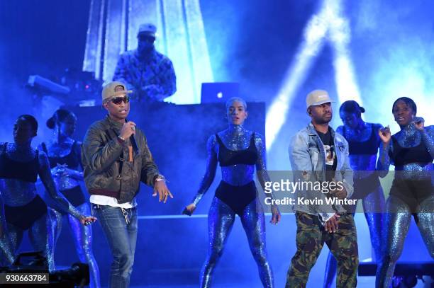 Pharrell Williams and Shay Haley of N.E.R.D perform onstage during the 2018 iHeartRadio Music Awards which broadcasted live on TBS, TNT, and truTV at...