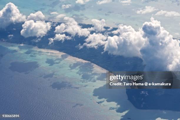 summer clouds on laut island in indonesia in south china sea daytime aerial view from airplane - laut stock pictures, royalty-free photos & images