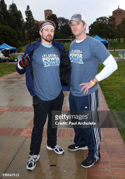 Actors Josh Kelly and Tom Degnan attend the "Power Of Tower" run/walk at UCLA on March 11, 2018 in Los Angeles, California.
