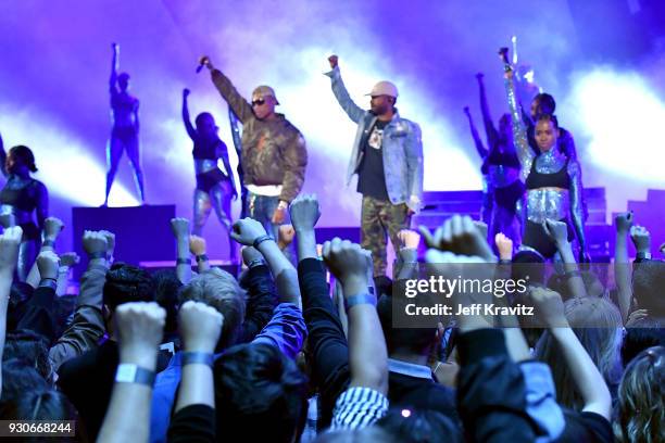 Pharrell Williams and Shay Haley of N.E.R.D perform onstage during the 2018 iHeartRadio Music Awards which broadcasted live on TBS, TNT, and truTV at...