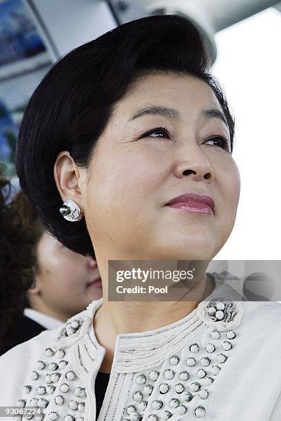 Kim Yoon-ok, wife of South Korea's President Lee Myung-bak, attends a tour at the Singapore Flyer observation wheel following the APEC Summit on...