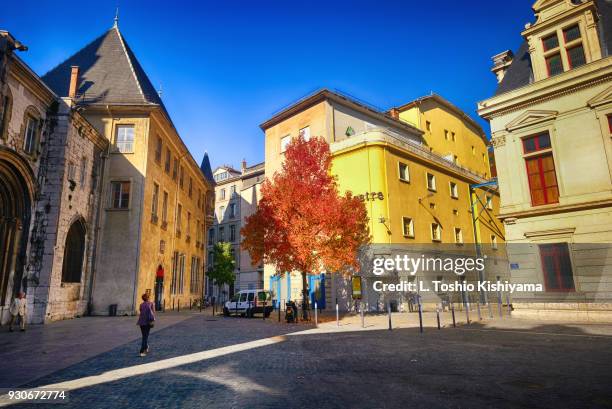 autumn in old town grenoble, france - grenoble stock pictures, royalty-free photos & images