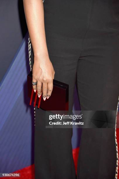 Laverne Cox, fashion detail, arrives at the 2018 iHeartRadio Music Awards which broadcasted live on TBS, TNT, and truTV at The Forum on March 11,...