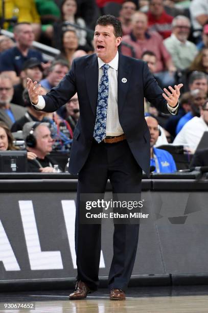 Head coach Steve Alford of the UCLA Bruins yells to his players during a semifinal game of the Pac-12 basketball tournament against the Arizona...