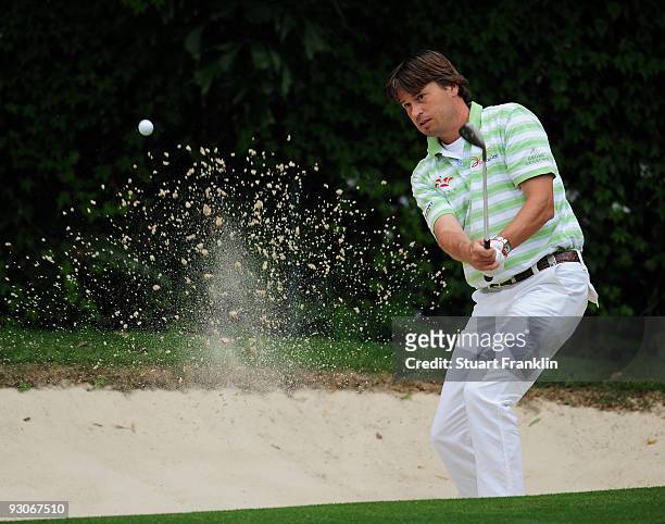 Robert Jan Derksen of The Netherlands plays his bunker shot on the 11th hole during the final round of the UBS Hong Kong Open at the Hong Kong Golf...