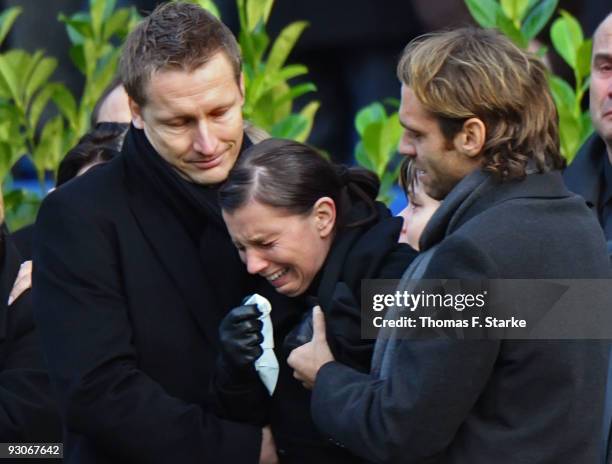 Widow Teresa Enke cries during the memorial service prior to Robert Enke's funeral at AWD Arena on November 15, 2009 in Hanover, Germany. Tens of...