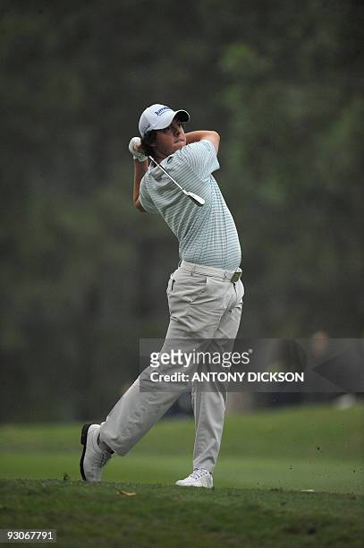 Rory McIlroy of Northern Ireland hits a shot during the final round of the Hong Kong Open golf tournament at the Hong Kong Golf Club in Fanling on...